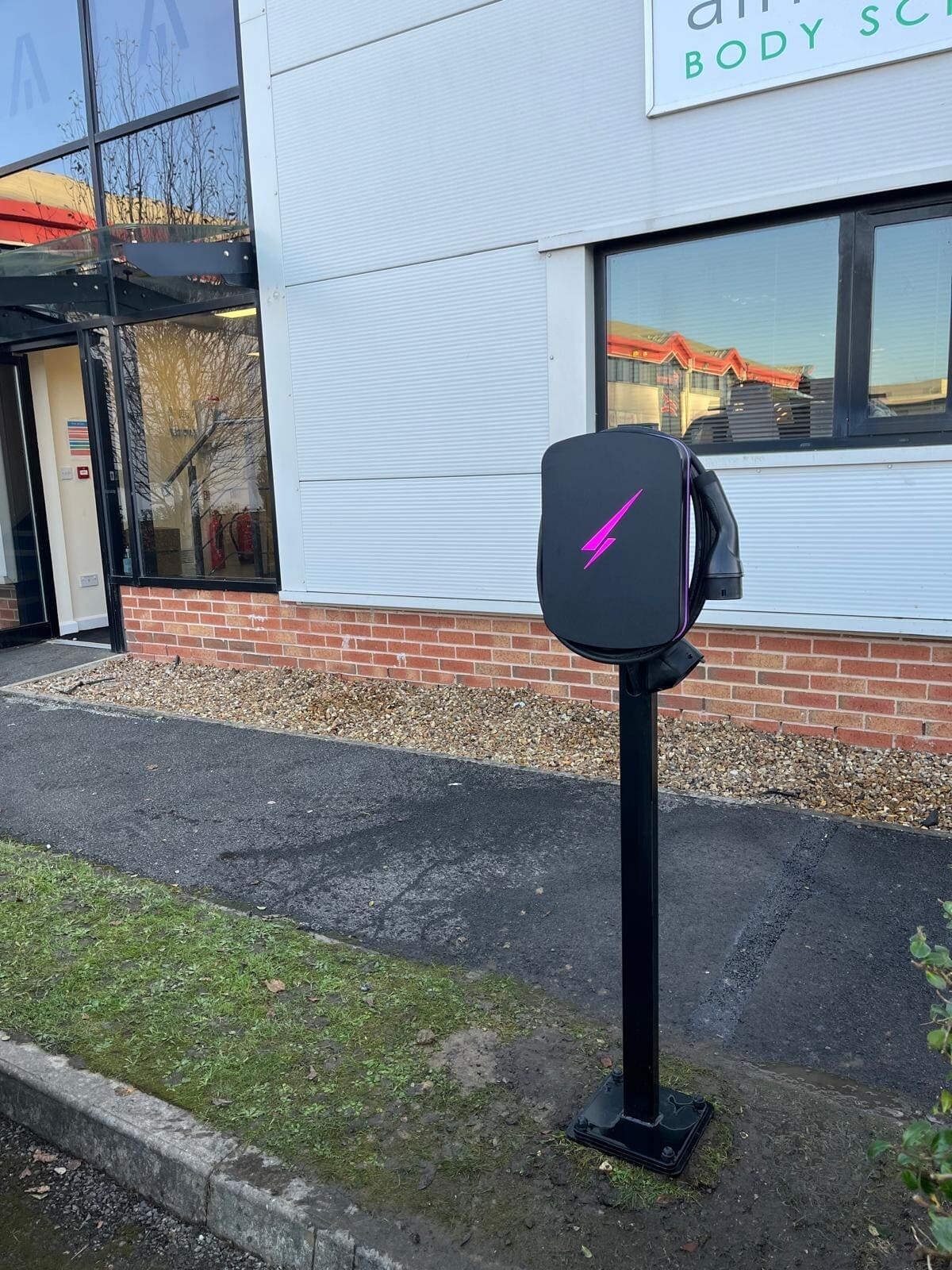 Commercial pedestal-mounted EV charger installed at a Lancashire workplace by Northern Tec